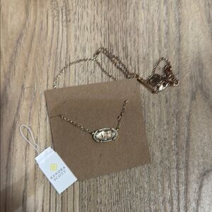 Gold Elisa Kendra Scott necklace